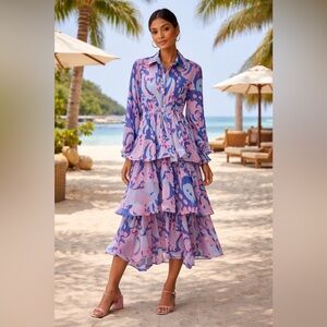 Retro Ripple Ruffle Dress with pink and blue swirling abstract colors